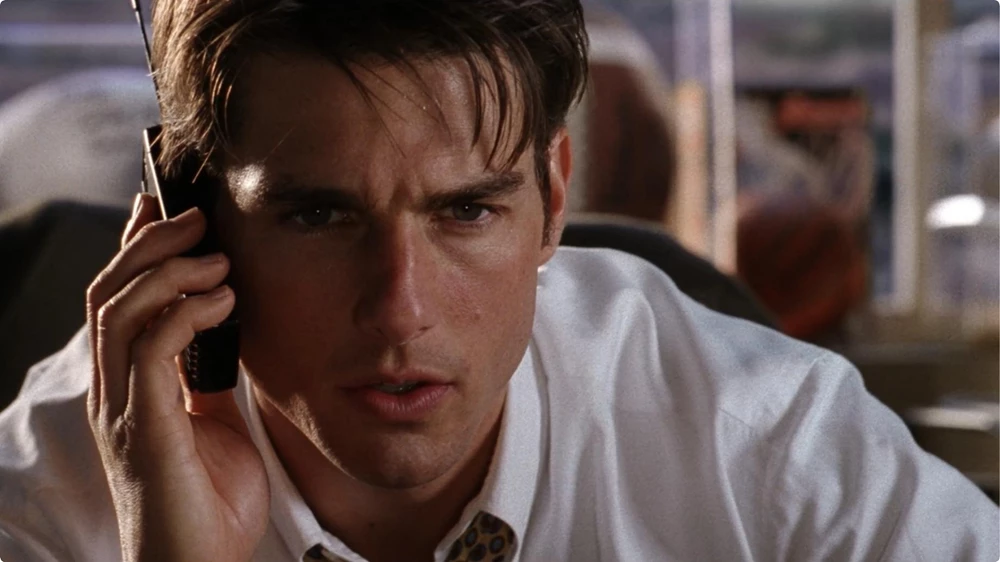 Jerry Maguire is shouting Show Me the Money to his client on the phone_Jerry Maguire is available to license for film screenings