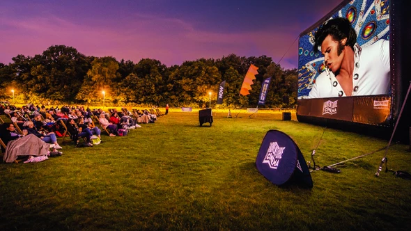On a lovely summer evening, the film Elvis is played at an Outdoor Screening organised by Adventure Cinema
